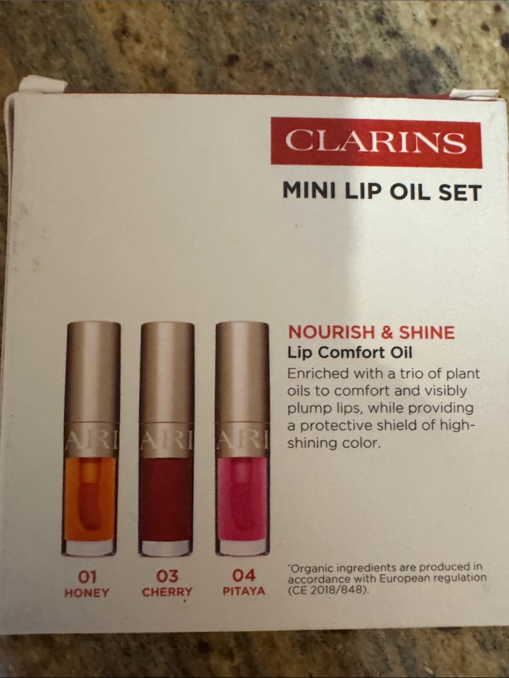 Clarins Lip Bliss Minis Lip Comfort Oil Trio - Red, Pink, Orange - Picture 2 of 10